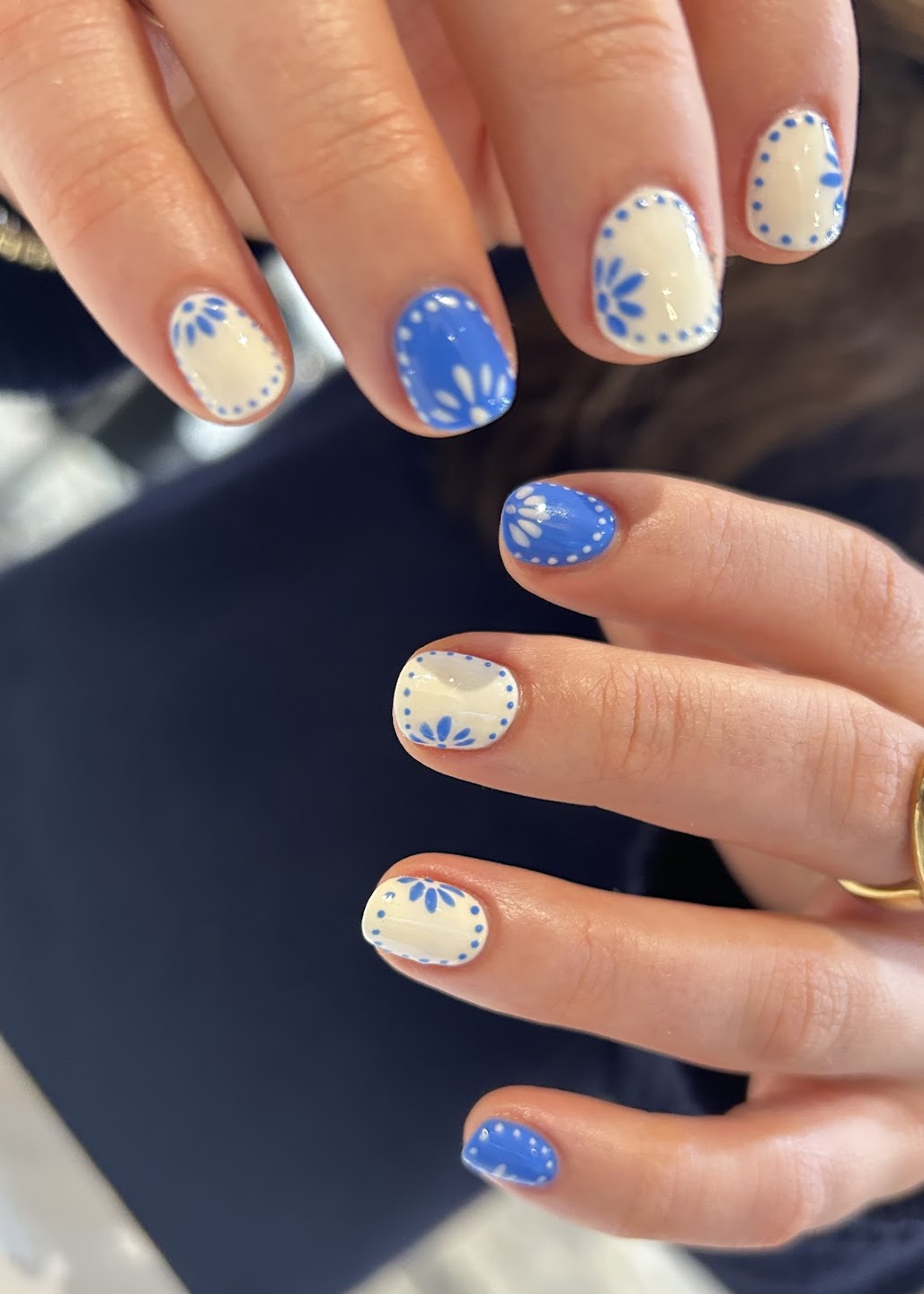 Blue and cream floral nail art